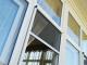 Москитные  сетки на деревянные окна для защиты дома от комаров